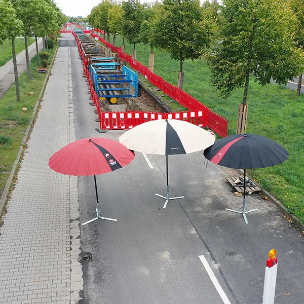 Bouwplaats — werkparaplu in gebruik